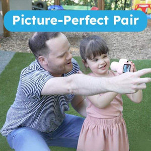 Father and daughter using Mini Photographer Digital Camera outdoors for family bonding and creative fun