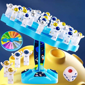 Balance Astronaut Stacking Game with colorful astronaut pieces, dice, and penalty tray for kids aged 4 and up.