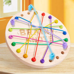 Children playing with a wooden rope untying challenge game promoting logical thinking and hand-eye coordination