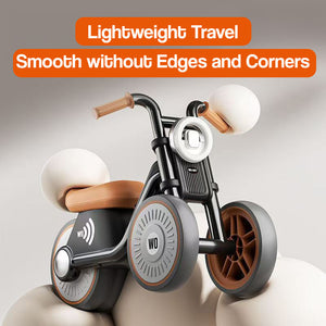 Tiny Biker Anti-Tip Light & Sound Motorcycle for kids ages 1-6 with anti-tip design, silent EVA wheels, and lightweight travel-friendly build