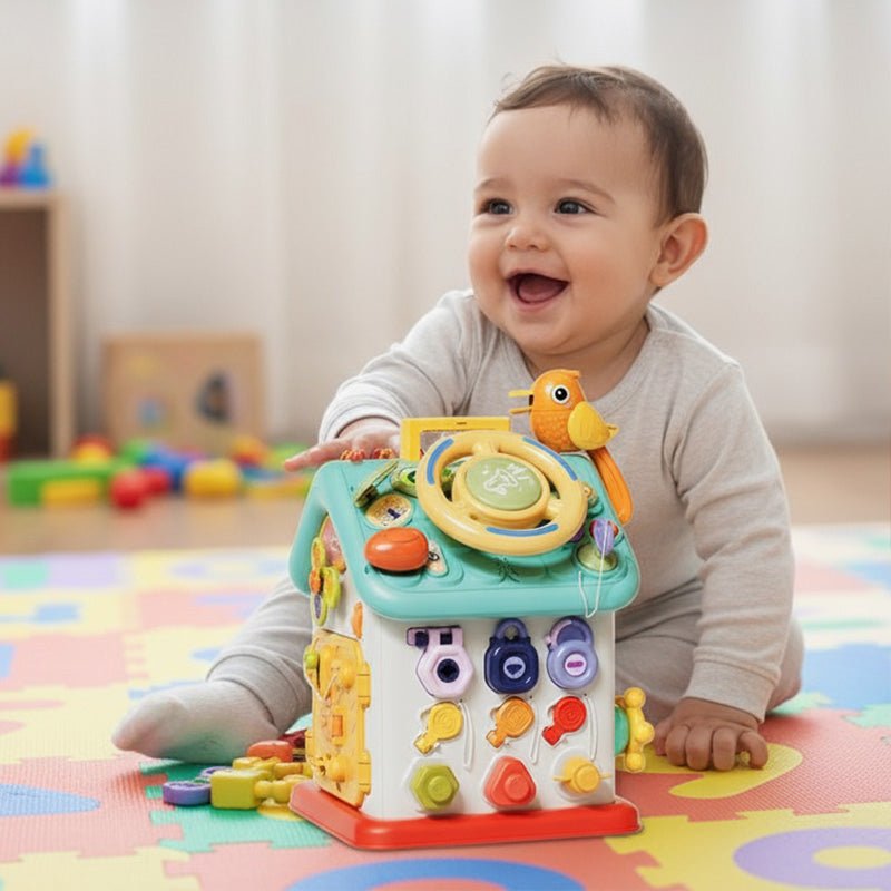 Baby playing with Montessori Busy House toy featuring colorful buttons, switches, and activities for fine motor skill development.