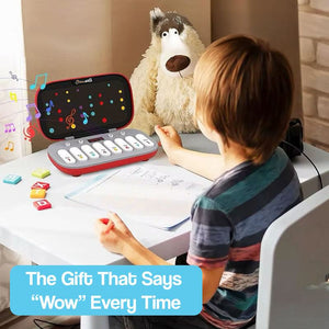 Child playing with MusiQ Rhythm Master 7-in-1 piano game on table with plush toy nearby