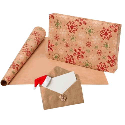Christmas wrapping paper with red and green snowflake design, brown envelope with card and Santa hat decoration